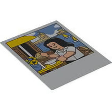 Part 106269 - Plastic Polaroid Photo with Minifigure with White Shirt and Black Hair, Outdoor Cafe, Water, and Castle and Black Square on Back Pattern