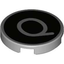 Part 14769pb438 - Tile, Round 2 x 2 with Bottom Stud Holder with Silver Capital Letter Q on Black Background Pattern