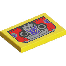 Part 26603pb526 - Tile 2 x 3 with Cassette Tape with Dark Purple and Silver Transformers Decepticon Logo and Circles on Black and Red Background Pattern (Laserbeak)
