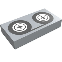 Part 3069p02 - Tile 1 x 2 with Black Tape Reels Pattern
