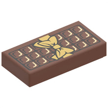 Part 3069pb0440 - Tile 1 x 2 with Candy Bar Chocolate Blocks and Gold Bow Pattern