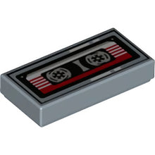 Part 3069pb1104 - Tile 1 x 2 with Cassette Tape with Red and White Striped Label and Black Frame Pattern