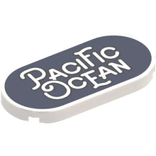 Part 66857pb022 - Tile, Round 2 x 4 Oval with Black Outline 'PACIFIC OCEAN' on Dark Blue Background Pattern