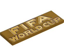 Part 69729pb232 - Tile 2 x 6 with Gold, White and Reddish Brown 'FIFA WORLD CUP' Pattern