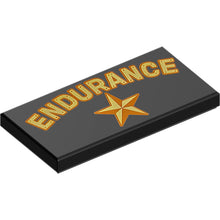 Part 87079pb1481 - Tile 2 x 4 with Gold and Dark Orange 'ENDURANCE' and Star Pattern