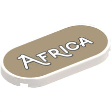 Part 66857pb019 - Tile, Round 2 x 4 Oval with Black Outline 'AFRICA' on Dark Tan Background Pattern