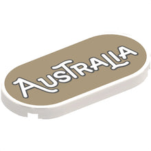Part 66857pb020 - Tile, Round 2 x 4 Oval with Black Outline 'AUSTRALIA' on Dark Tan Background Pattern
