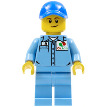 Minifig cty0689 - Medium Blue Uniform Shirt with Pocket and Octan Logo, Medium Blue Legs, Blue Cap with Hole, Lopsided Smile